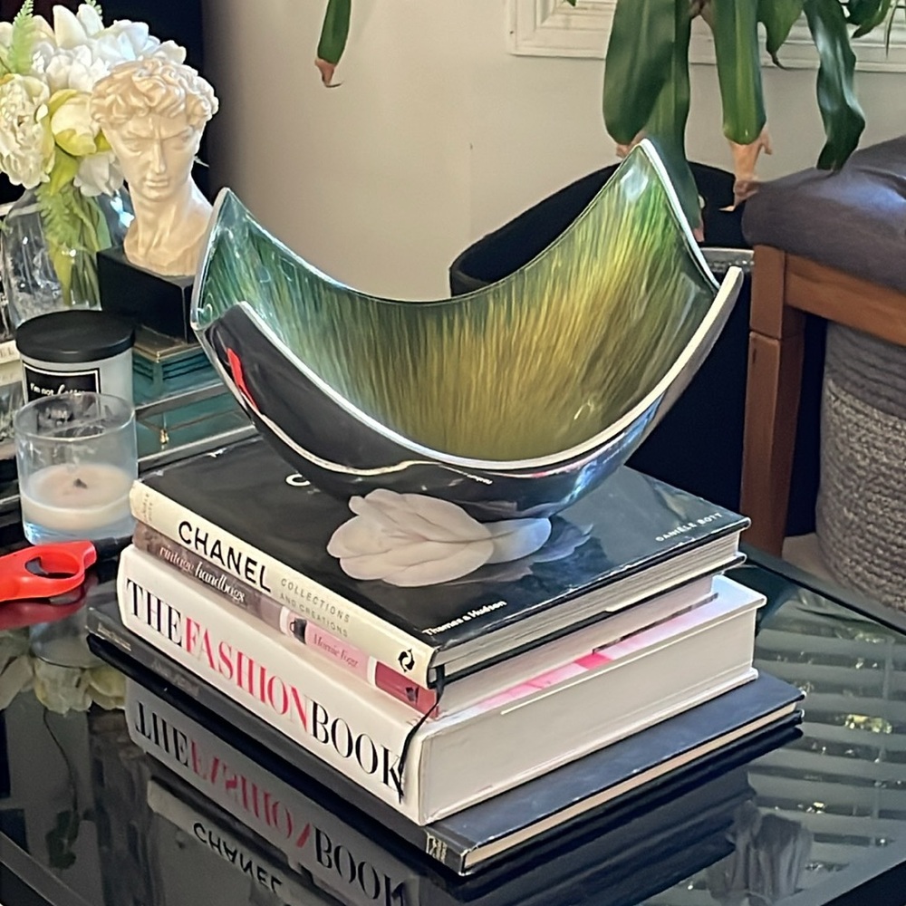Metal asymmetrical point curved bowl with decorative enamel interior